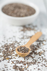 chia seeds on wooden surface
