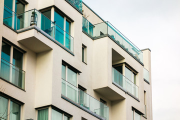 detailed view of white modern apartment building in cube style