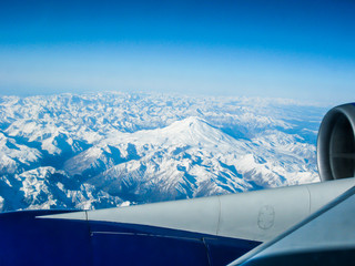 Panorama from height of flight of the aircraft in the valley of mount Elbrus and mount Elbrus in the North Caucasus of Russia in the winter