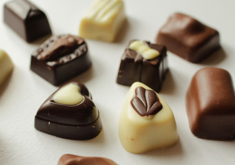 Delicious food - sweets- chocolate - Pralines made of black, milk and white chocolate