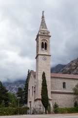 Fototapeta na wymiar Village of Dobrota and St.Eustace's Church on the shore of Kotor Bay. Montenegro. 