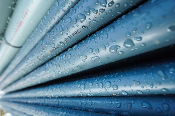 Blue PVC Water pipe with raindrops
