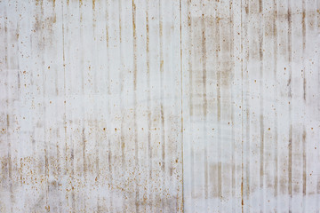 Dirty, old metal surface. White-grey grunge texture. Close up 