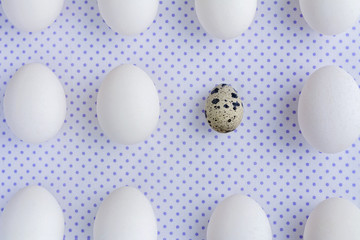 White eggs on polka dot fabric