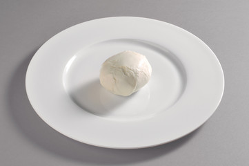 Fototapeta premium Round dish with buffalo mozzarella