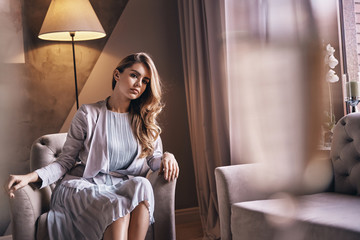 Lost in her thoughts.