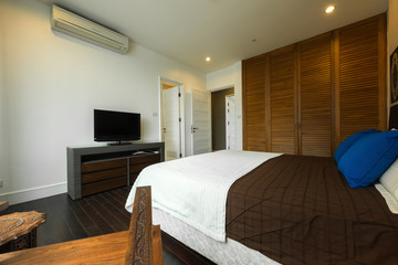 Modern bedroom interior - bed at home bedroom