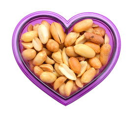 Processed peanuts isolated in bowl on white background