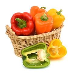 fresh pepper vegetables isolated in basket on white background