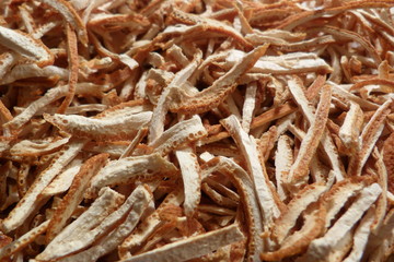 dry orange peel peel from fruit rusks peel white orange peel close-up oranges additive for tea flavoring fod for design back natural supplement dried vitamins