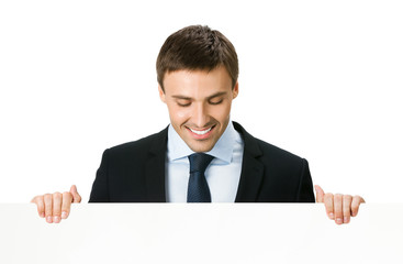 Businessman showing blank signboard, isolated