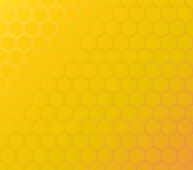 Honeycomb yellow background of hexagons in colors of honey. Vector seamles pattern.