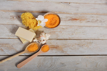 fruit bath salt with olive oil and gray natural soap next to the orchid with place for text