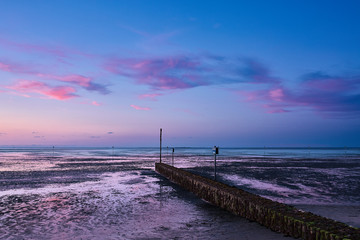 Fototapeta premium Sonnenuntergang Wattenmeer Schillig