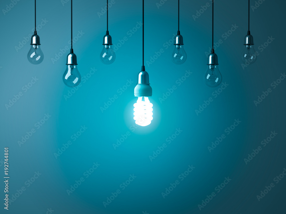 Leinwandbilder one hanging energy saving light bulb glowing stand out from unlit incandescent bulbs with reflection