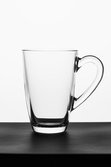 Empty glass for water, juice, cappuccino or milk on white background