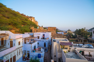 Bundi cityscape at sunset. The majestic city palace on Lake Pichola, travel destination in Rajasthan, India