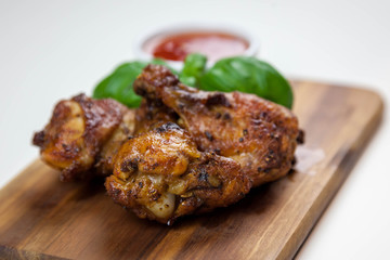 Chicken wings with sweet chilli sauce on the white background