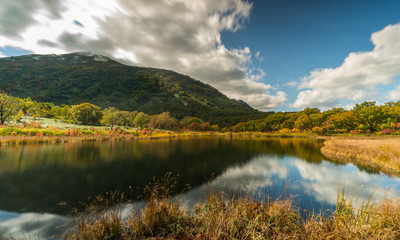 The water reflection of Shinsen-Numa marsh and Annapuri peak in Autmn with long exposure photography