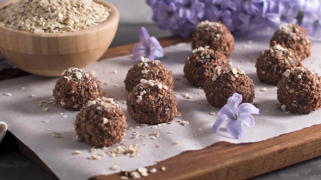 Homemade fresh energy balls with chocolate.