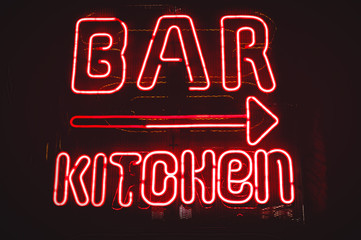 Fototapeta na wymiar Bar and Kitchen red neon sign
