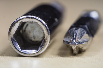 Joinery accessories in a large magnification. The screwdriver bit is shown in macro technology.