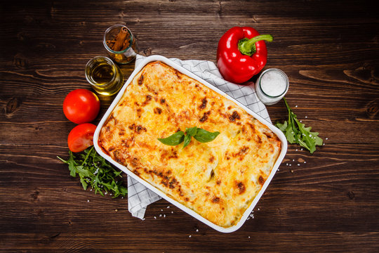 Lasagna On Wooden Table