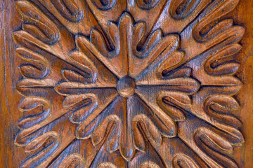 brown flower carved wood