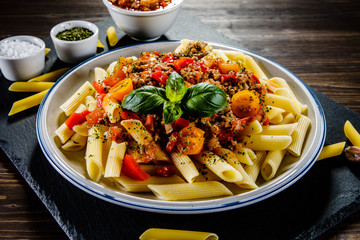 Pasta with meat, tomato sauce and vegetables