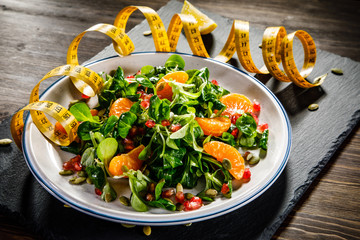Vegetable salad on wooden background