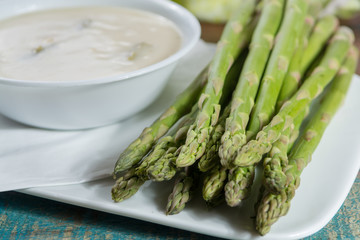 Seasonal fresh homemade asparagus soup made from white and green asparagus vegetables