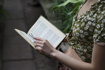 the girl is reading a book
