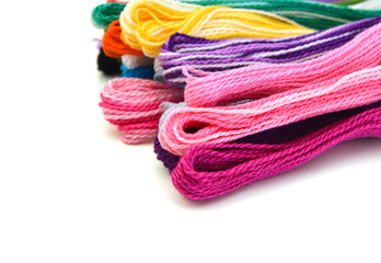 Colorful  thread on white background with copy space.