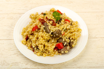 Bulgur with chicken hearts