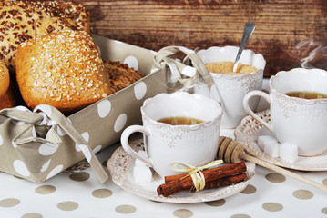 hot sweet herbal tea with fresh crunchy scones with lots of cane and sugar for a healthy breakfast every morning