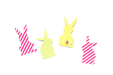 Festive decor of handmade - Easter bunny (Easter rabbit)craft of paper, isolated on white background.