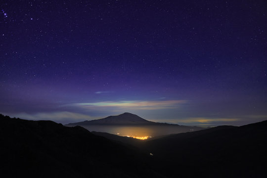 Night Lights Town And Etna Volcano From Nebrodi Park, Sicily