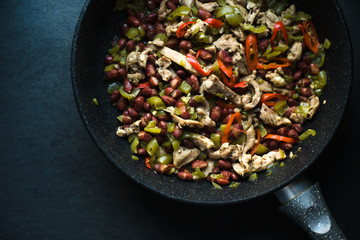 Frying pan with ready fajita top view. Mexican cuisine.