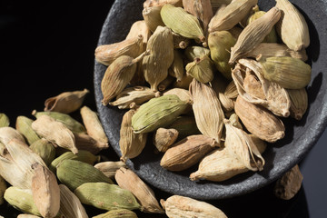 Macro collection, dried green cardamom pods close up