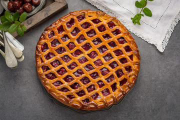 Homemade open sour cherry pie, delicious sweet dessert