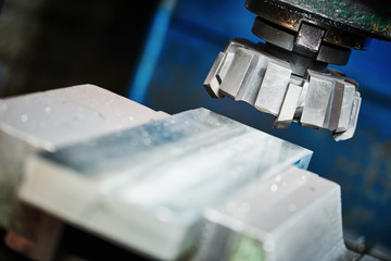 Fototapeta na wymiar industrial metalworking cutting process by milling cutter