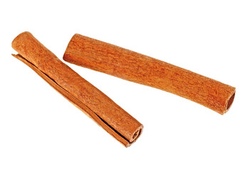 Two cinnamon sticks isolated on white background