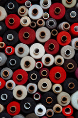 set threads different color sewing needlework different multicolored palette warm red black bright shade gray red white
