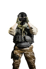 Photo of an isolated soldier in outfit posing and holding binoculars.