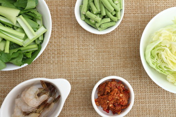 food , thai herbs and spices ,Thai spices ingredient for spicy food over wooden texture and background,