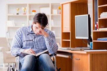 Disabled student studying at home on wheelchair