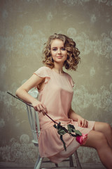 Pretty woman portrait in light interior 