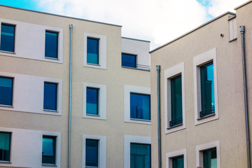 detailed view of modern apartment buildings with square windows