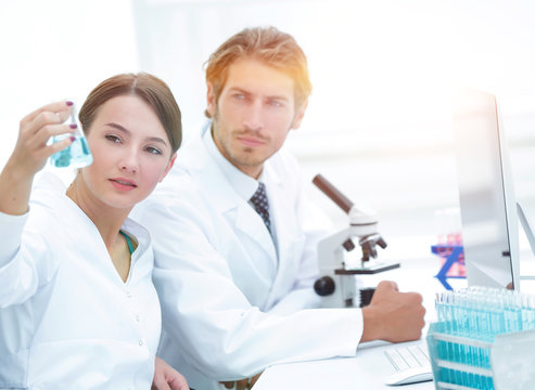 Team of Biologists Researchers Working in Laboratory