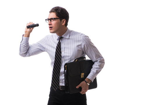 Young handsome businessman looking into future with binoculars